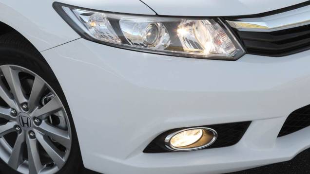 Os preços da linha 2014 variam entre R$ 66.690 (LXS 1.8 manual) e R$ 83.890 (EXR 2.0 automático) | <a href="https://preprod.quatrorodas.abril.com.br/noticias/fabricantes/honda-civic-2014-ganha-motor-2-0-730338.shtml" rel="migration">Leia mais</a> Os preços da linha 2014 variam entre R$ 66.690 (LXS 1.8 manual) e R$ 83.890 (EXR 2.0 automático) | <a href="https://preprod.quatrorodas.abril.com.br/noticias/fabricantes/honda-civic-2014-ganha-motor-2-0-730338.shtml" rel="migration">Leia mais</a>