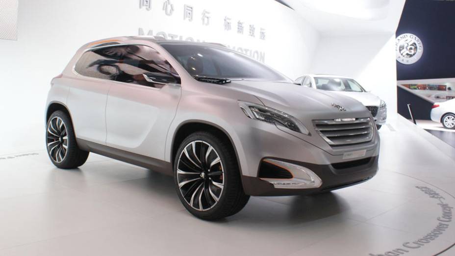 Peugeot Urban Crossover concept | <a href="https://preprod.quatrorodas.abril.com.br/galerias/saloes/pequim/2012/peugeot-urban-concept-682724.shtml" rel="migration">Veja mais fotos</a>