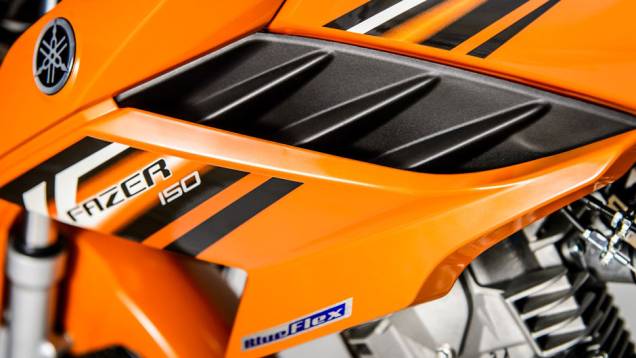As tampas laterais são em peça única, o que facilita a manutenção da moto | <a href="https://preprod.quatrorodas.abril.com.br/moto/noticias/yamaha-lanca-ys150-fazer-r-7-390-00-752066.shtml" rel="migration">Leia mais</a> As tampas laterais são em peça única, o que facilita a manutenção da moto | <a href="https://preprod.quatrorodas.abril.com.br/moto/noticias/yamaha-lanca-ys150-fazer-r-7-390-00-752066.shtml" rel="migration">Leia mais</a>