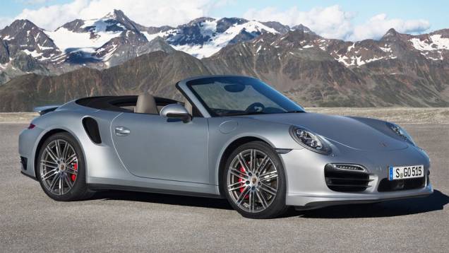 Porsche revela 911 Turbo Cabriolet 2014 | <a href="https://preprod.quatrorodas.abril.com.br/noticias/fabricantes/porsche-revela-911-turbo-turbo-s-cabriolet-754889.shtml" rel="migration">Leia mais</a> Porsche revela 911 Turbo Cabriolet 2014 | <a href="https://preprod.quatrorodas.abril.com.br/noticias/fabricantes/porsche-revela-911-turbo-turbo-s-cabriolet-754889.shtml" rel="migration">Leia mais</a>