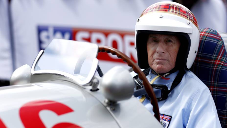 Uma das presenças ilustres foi a do tricampeão mundial de F-1, sir Jackie Stewart | <a href="https://preprod.quatrorodas.abril.com.br/galerias/especiais/festival-goodwood-2014-parte-1-787499.shtml" rel="migration">Parte 1</a>