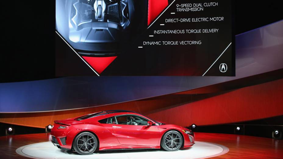 Acura NSX | <a href="https://preprod.quatrorodas.abril.com.br/noticias/saloes/detroit-2015/acura-oficializa-nsx-modelo-pode-vir-ao-brasil-824741.shtml" rel="migration">Leia mais</a> | <a href="https://preprod.quatrorodas.abril.com.br/galerias/saloes/detroit-2015/direto-detroit-parte-2-825561" rel="migration"></a>