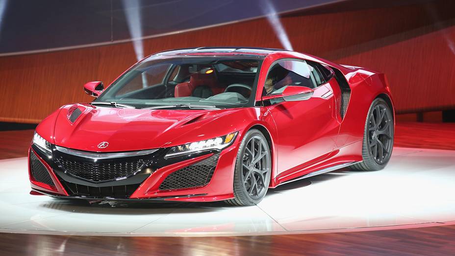 Acura NSX | <a href="https://preprod.quatrorodas.abril.com.br/noticias/saloes/detroit-2015/acura-oficializa-nsx-modelo-pode-vir-ao-brasil-824741.shtml" rel="migration">Leia mais</a> | <a href="https://preprod.quatrorodas.abril.com.br/galerias/saloes/detroit-2015/direto-detroit-parte-2-825561" rel="migration"></a>