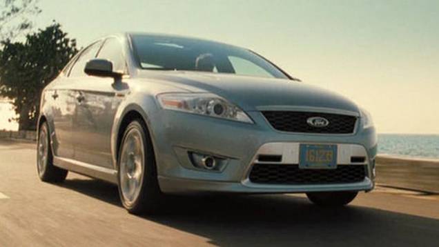 2006: Daniel Craig assume o personagem e desfruta de diversos automóveis em 007 - Cassino Royale". Um deles é o Ford Mondeo. | <a href="%20https://preprod.quatrorodas.abril.com.br/blogs/planeta-carro/2012/11/07/licenca-para-acelerar/" rel="migration">Leia mais</a> 2006: Daniel Craig assume o personagem e desfruta de diversos automóveis em 007 - Cassino Royale". Um deles é o Ford Mondeo. | <a href="%20https://preprod.quatrorodas.abril.com.br/blogs/planeta-carro/2012/11/07/licenca-para-acelerar/" rel="migration">Leia mais</a>