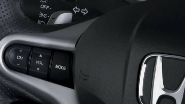 Versão EX automática ganhou borboletas para troca de marchas atrás do volante | <a href="https://preprod.quatrorodas.abril.com.br/carros/lancamentos/honda-fit-2013-680204.shtml" rel="migration">Leia mais</a> Versão EX automática ganhou borboletas para troca de marchas atrás do volante | <a href="https://preprod.quatrorodas.abril.com.br/carros/lancamentos/honda-fit-2013-680204.shtml" rel="migration">Leia mais</a>
