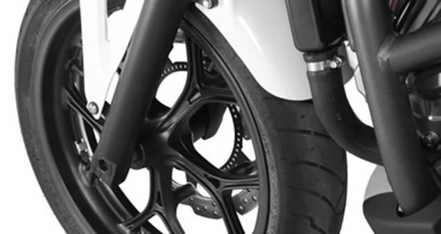 Na versão com freios Combined ABS (C-ABS), a dianteira recebe pinças de três pistões | <a href="https://preprod.quatrorodas.abril.com.br/moto/noticias/honda-nc-700x-made-in-manaus-691787.shtml" rel="migration">Leia mais</a> Na versão com freios Combined ABS (C-ABS), a dianteira recebe pinças de três pistões | <a href="https://preprod.quatrorodas.abril.com.br/moto/noticias/honda-nc-700x-made-in-manaus-691787.shtml" rel="migration">Leia mais</a>