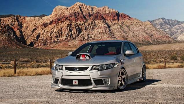 O Forte de 5 portas foi o presente da Kia para o Cyborg, o benfeitor metade homem, metade máquina. | <a href="https://preprod.quatrorodas.abril.com.br/noticias/entretenimento/kia-mostra-cinco-carros-super-herois-713665.shtml" rel="migration">Leia mais</a> O Forte de 5 portas foi o presente da Kia para o Cyborg, o benfeitor metade homem, metade máquina. | <a href="https://preprod.quatrorodas.abril.com.br/noticias/entretenimento/kia-mostra-cinco-carros-super-herois-713665.shtml" rel="migration">Leia mais</a>