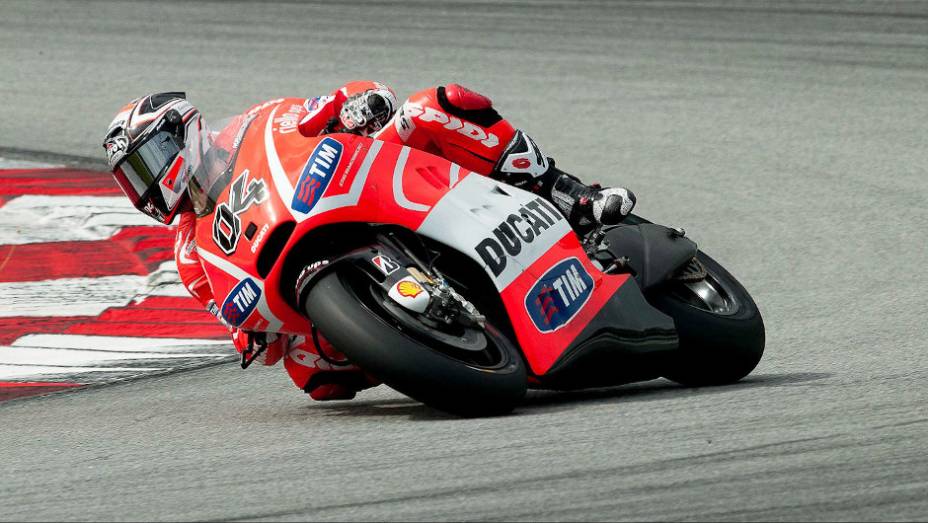 Andrea Dovizioso (Ducati Team) ficou em oitavo no último dia de testes em Sepang. <a href="https://preprod.quatrorodas.abril.com.br/moto/noticias/motogp-pedrosa-lidera-ultimo-dia-sepang-734820.shtml" rel="migration">Leia mais</a>