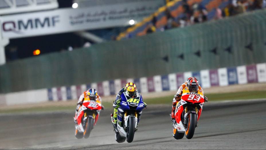 Rossi realizou importantes ultrapassagens nas últimas voltas | <a href="https://preprod.quatrorodas.abril.com.br/moto/noticias/motogp-jorge-lorenzo-vence-corrida-catar-738020.shtml" rel="migration">Leia mais</a>