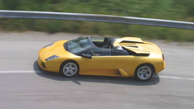 Murciélago Roadster 2004 - Lançado no Salão de Genebra de 2004, ele tinha tração nas quatro rodas e não deveria passar de 16t0 km/h com seu teto removível | <a href="%20https://preprod.quatrorodas.abril.com.br/reportagens/classicos/festa-bolonhesa-741081.shtml" rel="migration">Leia</a> Murciélago Roadster 2004 - Lançado no Salão de Genebra de 2004, ele tinha tração nas quatro rodas e não deveria passar de 16t0 km/h com seu teto removível | <a href="%20https://preprod.quatrorodas.abril.com.br/reportagens/classicos/festa-bolonhesa-741081.shtml" rel="migration">Leia</a>