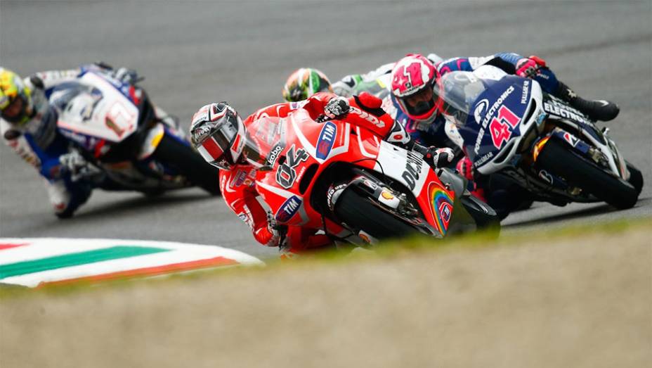 Andrea Dovizioso, companheiro de equipe de Hayden, ficou com o sétimo tempo | <a href="https://preprod.quatrorodas.abril.com.br/moto/noticias/motogp-yamaha-domina-treino-mugello-742926.shtml" rel="migration">Leia mais</a> Andrea Dovizioso, companheiro de equipe de Hayden, ficou com o sétimo tempo | <a href="https://preprod.quatrorodas.abril.com.br/moto/noticias/motogp-yamaha-domina-treino-mugello-742926.shtml" rel="migration">Leia mais</a>