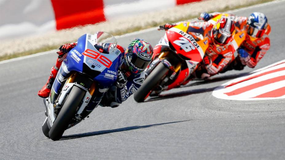 Lorenzo fez uma largada espetacular | <a href="https://preprod.quatrorodas.abril.com.br/moto/noticias/motogp-lorenzo-domina-gp-catalunha-744220.shtml" rel="migration">Leia mais</a>