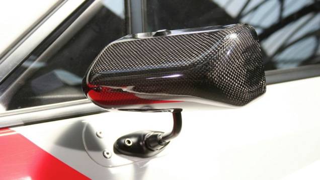 Para obter essa redução, a Toyota introduziu materiais como fibra de carbono, polímeros reforçados com fibra e policarbonato em sua estrutura | <a href="https://preprod.quatrorodas.abril.com.br/noticias/fabricantes/toyota-mostra-novos-fotos-gt86-trd-griffon-projec" rel="migration"></a> Para obter essa redução, a Toyota introduziu materiais como fibra de carbono, polímeros reforçados com fibra e policarbonato em sua estrutura | <a href="https://preprod.quatrorodas.abril.com.br/noticias/fabricantes/toyota-mostra-novos-fotos-gt86-trd-griffon-projec" rel="migration"></a>