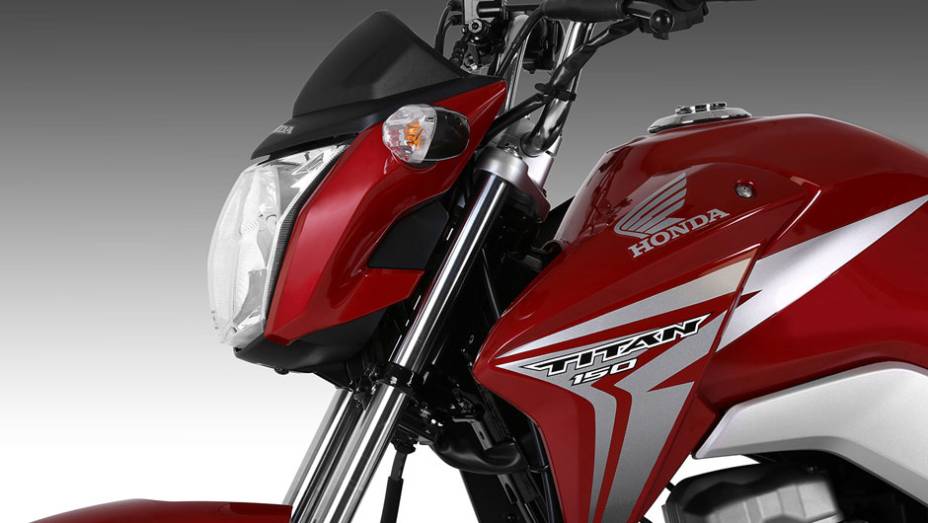 Honda CG 150 Titan e o novo design do tanque de combustível | <a href="https://preprod.quatrorodas.abril.com.br/moto/noticias/honda-lanca-cg-2014-totalmente-renovada-748587.shtml" rel="migration">Leia mais</a>