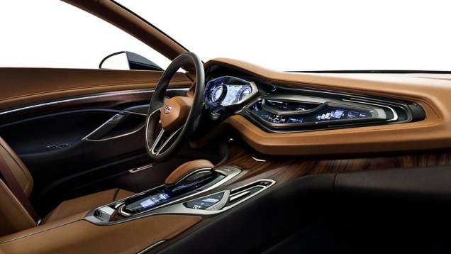 O console central é elevado, os banco são esportivos e revestidos em couro caramelo, assim como outras partes da cabine | <a href="https://preprod.quatrorodas.abril.com.br/noticias/fabricantes/cadillac-elmiraj-concept-revelado-750167.shtml" rel="migration">Leia mais</a> O console central é elevado, os banco são esportivos e revestidos em couro caramelo, assim como outras partes da cabine | <a href="https://preprod.quatrorodas.abril.com.br/noticias/fabricantes/cadillac-elmiraj-concept-revelado-750167.shtml" rel="migration">Leia mais</a>