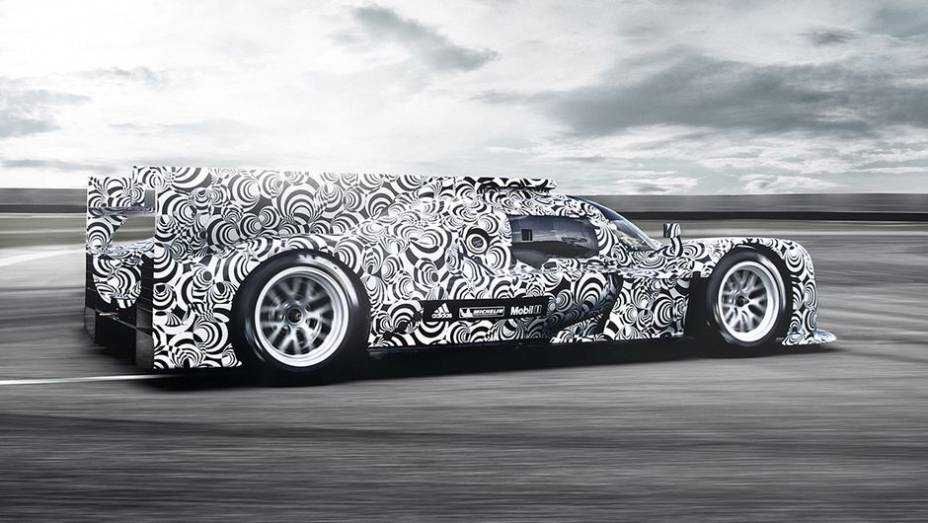 O australiano Mark Webber será um dos pilotos | <a href="https://preprod.quatrorodas.abril.com.br/noticias/fabricantes/porsche-revela-imagens-seu-lmp1-751419.shtml" rel="migration">Leia mais</a> O australiano Mark Webber será um dos pilotos | <a href="https://preprod.quatrorodas.abril.com.br/noticias/fabricantes/porsche-revela-imagens-seu-lmp1-751419.shtml" rel="migration">Leia mais</a>