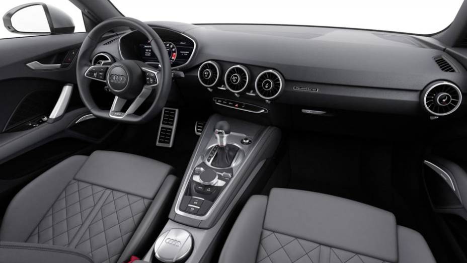 Internamente, o novo TT é equipado com volante de base achatada, display de informações de 12,3 polegadas... | <a href="https://preprod.quatrorodas.abril.com.br/noticias/saloes/genebra-2014/audi-apresenta-novo-tt-775222.shtml" rel="migration">Leia mais</a>