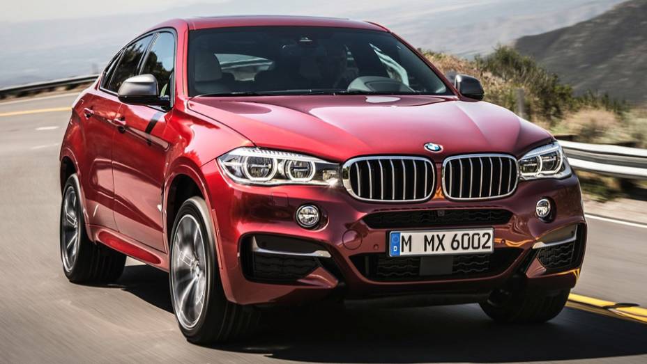 A BMW apresentou oficialmente o modelo 2015 do X6 | <a href="https://preprod.quatrorodas.abril.com.br/noticias/fabricantes/bmw-oficializa-x6-2015-785241.shtml" rel="migration">Leia mais</a>