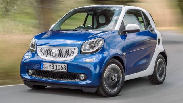 Smart ForTwo | <a href="https://preprod.quatrorodas.abril.com.br/noticias/mercado/candidatos-carro-ano-2015-europa-sao-revelados-791548.shtml" rel="migration">Leia mais</a> Smart ForTwo | <a href="https://preprod.quatrorodas.abril.com.br/noticias/mercado/candidatos-carro-ano-2015-europa-sao-revelados-791548.shtml" rel="migration">Leia mais</a>