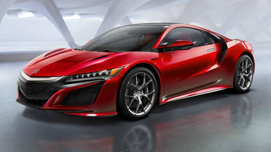 Acabou a espera. Após longos anos de desenvolvimento, a Acura finalmente revelou a versão de produção do NSX | <a href="https://preprod.quatrorodas.abril.com.br/noticias/saloes/detroit-2015/acura-oficializa-nsx-modelo-pode-vir-ao-brasil-824741.shtml" rel="migration">Leia mais</a>