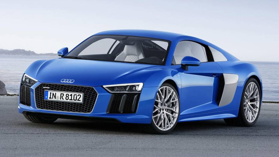 O Audi R8 passou por uma dieta rígida e perdeu 200 kg em sua nova geração | <a href="https://preprod.quatrorodas.abril.com.br/noticias/saloes/genebra-2015/audi-revela-oficialmente-nova-geracao-esportivo-r8-841481.shtml" rel="migration">Leia mais</a>