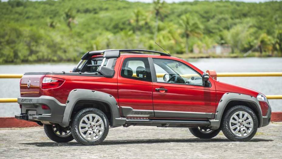 Al&eacute;m da inova&ccedil;&atilde;o, a inten&ccedil;&atilde;o da marca foi facilitar o acesso ao banco de tr&aacute;s | <a href="https://preprod.quatrorodas.abril.com.br/carros/lancamentos/fiat-strada-2014-757188.shtml" rel="migration">Leia mais</a>