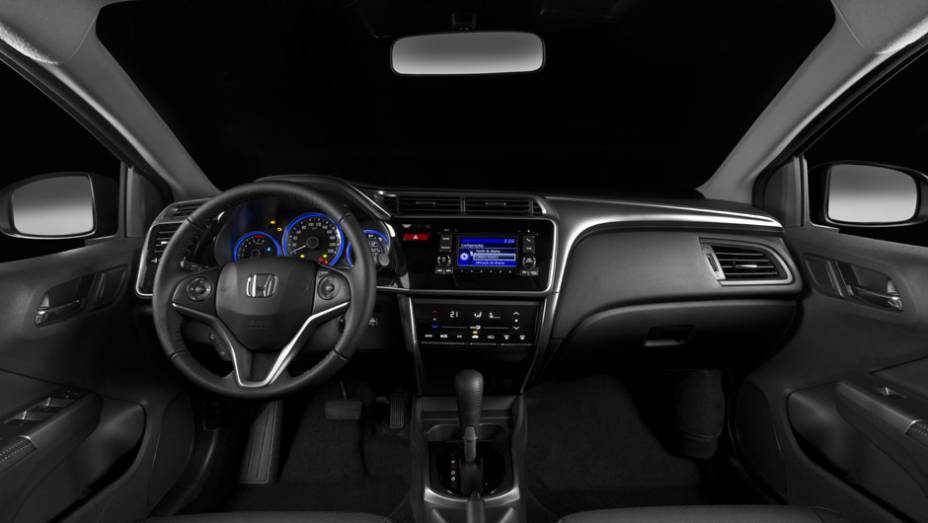 O painel parece o mesmo do Fit, mas tem itens exclusivos, como o ar-condicionado com tela touchscreen | <a href="https://preprod.quatrorodas.abril.com.br/carros/lancamentos/honda-city-800143.shtml" rel="migration">Leia mais</a>