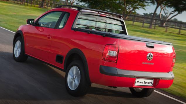 Quase nada mudou na traseira, nem as lanternas | <a href="https://preprod.quatrorodas.abril.com.br/carros/lancamentos/vw-saveiro-2014-738896.shtml" rel="migration">Leia mais</a> Quase nada mudou na traseira, nem as lanternas | <a href="https://preprod.quatrorodas.abril.com.br/carros/lancamentos/vw-saveiro-2014-738896.shtml" rel="migration">Leia mais</a>