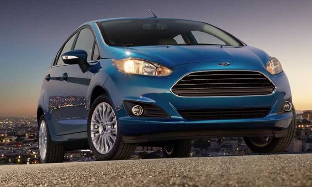 O estilo lembra o novo Fusion, principalmente pelo desenho da grade frontal | <a href="https://preprod.quatrorodas.abril.com.br/carros/lancamentos/ford-new-fiesta-2014-739245.shtml" rel="migration">Leia mais</a> O estilo lembra o novo Fusion, principalmente pelo desenho da grade frontal | <a href="https://preprod.quatrorodas.abril.com.br/carros/lancamentos/ford-new-fiesta-2014-739245.shtml" rel="migration">Leia mais</a>