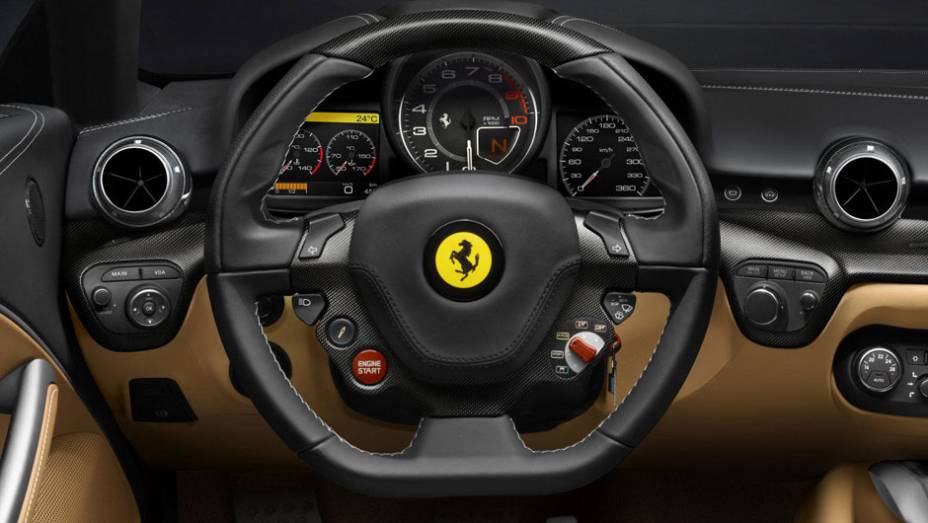 Sistema "Human Machine Interface" permite ajustar a maioria dos controles por comandos no volante | <a href="https://preprod.quatrorodas.abril.com.br/saloes/genebra/2012/ferrari-f12berlinetta-678494.shtml" rel="migration">Leia mais</a>