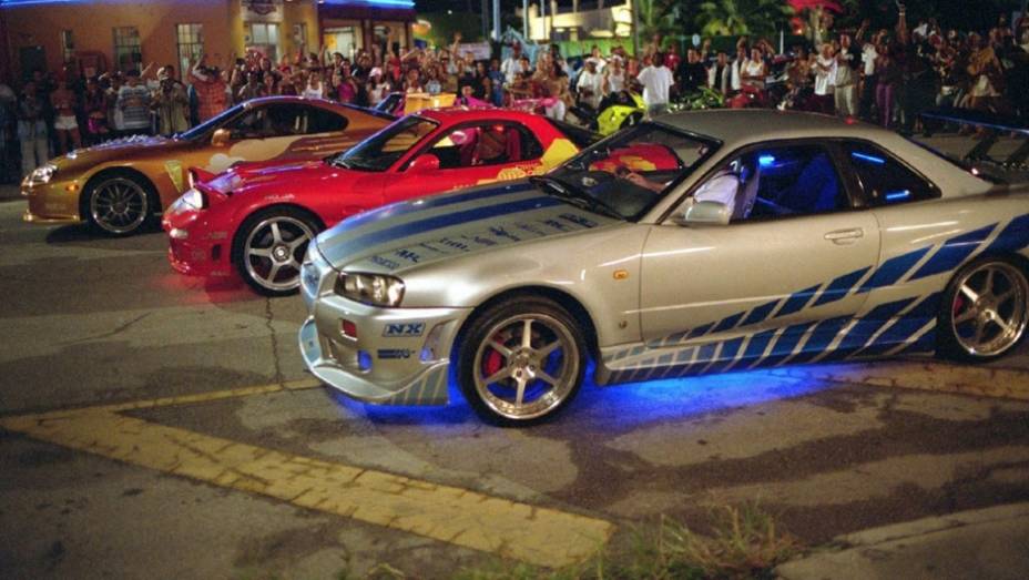 Nissan Skyline R34: apesar de não ter repetido o sucesso do primeiro filme, "Mais Velozes Mais Furiosos" fez a fama do cupê fora do Japão, mesmo com o carro prateado aparecendo poucos minutos