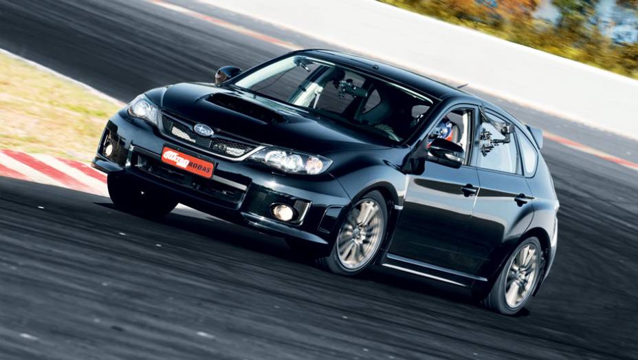 Tração integral ajudou o Impreza a contornar as curvas de alta | <a href="https://preprod.quatrorodas.abril.com.br/reportagens/geral/camaro-x-ds3-x-punto-x-jetta-x-impreza-703736.shtml" rel="migration">Leia mais</a> Tração integral ajudou o Impreza a contornar as curvas de alta | <a href="https://preprod.quatrorodas.abril.com.br/reportagens/geral/camaro-x-ds3-x-punto-x-jetta-x-impreza-703736.shtml" rel="migration">Leia mais</a>