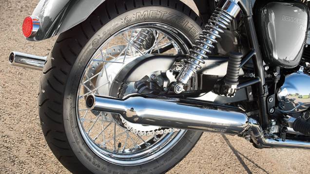 Com estilo até no cobre-corrente | <a href="https://preprod.quatrorodas.abril.com.br/moto/testes/triumph-bonneville-t100-741213.shtml" rel="migration">Leia mais</a> Com estilo até no cobre-corrente | <a href="https://preprod.quatrorodas.abril.com.br/moto/testes/triumph-bonneville-t100-741213.shtml" rel="migration">Leia mais</a>