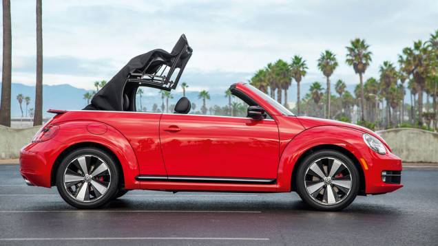 São só 9,5 segundos para descer a capota... | <a href="https://preprod.quatrorodas.abril.com.br/carros/impressoes/vw-fusca-cabrio-729186.shtml" rel="migration">Leia mais</a> São só 9,5 segundos para descer a capota... | <a href="https://preprod.quatrorodas.abril.com.br/carros/impressoes/vw-fusca-cabrio-729186.shtml" rel="migration">Leia mais</a>