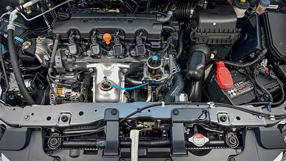 Nesta vers&atilde;o, o motor 1.8 entrega 140 cv de pot&ecirc;ncia | <a href="https://preprod.quatrorodas.abril.com.br/carros/testes/honda-civic-2014-735270.shtml" rel="migration">Leia mais</a>