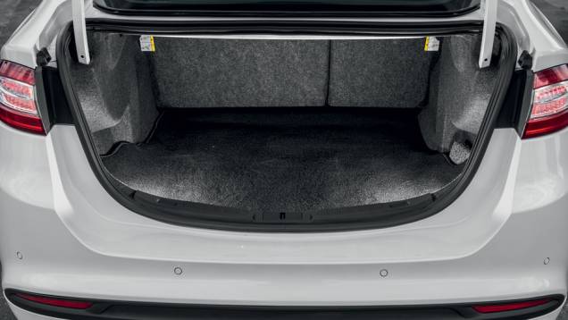 Capacidade do porta-malas: 514 litros | <a href="https://preprod.quatrorodas.abril.com.br/carros/testes/ford-fusion-2-5-flex-736957.shtml" rel="migration">Leia mais</a> Capacidade do porta-malas: 514 litros | <a href="https://preprod.quatrorodas.abril.com.br/carros/testes/ford-fusion-2-5-flex-736957.shtml" rel="migration">Leia mais</a>
