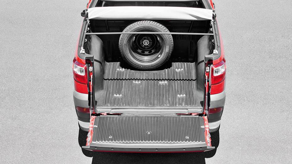 Ca&ccedil;amba curta: 680 litros ou 650 kg | <a href="https://preprod.quatrorodas.abril.com.br/carros/impressoes/fiat-strada-working-1-4-764158.shtml" rel="migration">Leia mais</a>