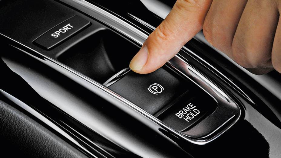 Vers&atilde;o h&iacute;brida tem alavanca de c&acirc;mbio minimalista, com modo Park por tecla | <a href="https://preprod.quatrorodas.abril.com.br/carros/impressoes/honda-vezel-777550.shtml" rel="migration">Leia mais</a>