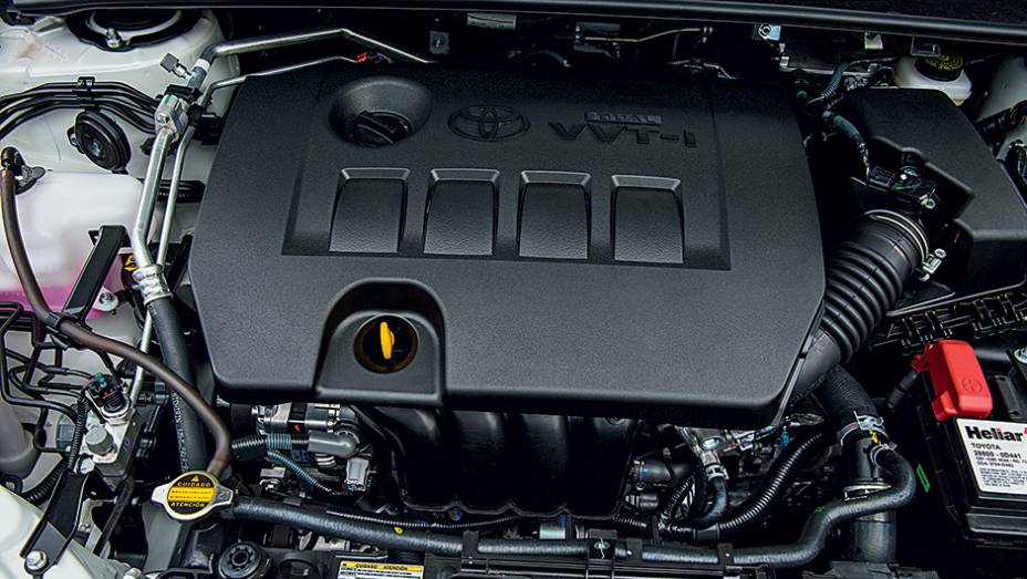 Motor 1.8 abandonou o tanquinho de partida a frio | <a href="https://preprod.quatrorodas.abril.com.br/carros/testes/toyota-corolla-gli-1-8-783149.shtml" rel="migration">Leia mais</a>
