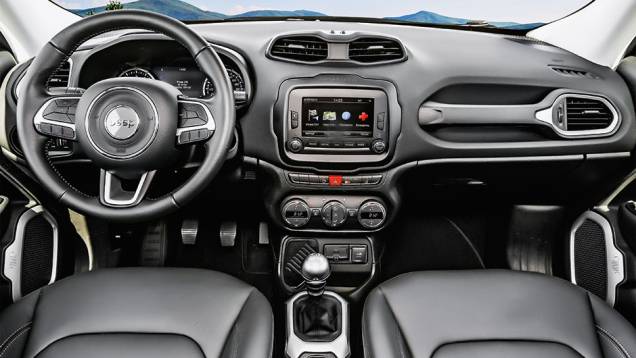 Volante multifuncional cheio de botões e apoio de mão para encarar o off-road | <a href="https://preprod.quatrorodas.abril.com.br/carros/impressoes/jeep-renegade-808905.shtml" target="_blank" rel="migration">Leia mais</a> Volante multifuncional cheio de botões e apoio de mão para encarar o off-road | <a href="https://preprod.quatrorodas.abril.com.br/carros/impressoes/jeep-renegade-808905.shtml" target="_blank" rel="migration">Leia mais</a>