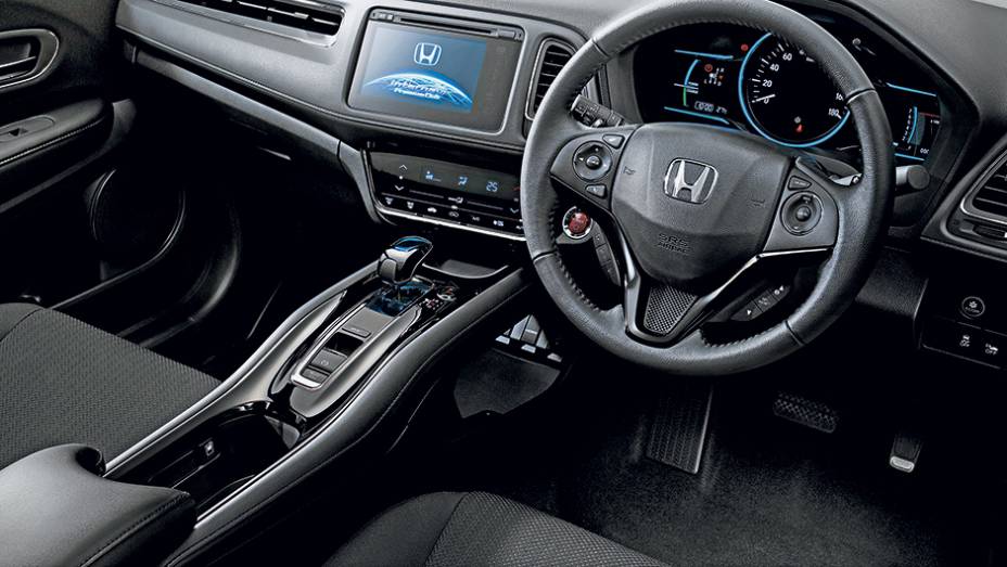 Painel da versão híbrida avaliada no Japão é o mais completo, mas não vem para cá. O console flutuante será mantido | <a href="https://preprod.quatrorodas.abril.com.br/carros/impressoes/honda-hr-v-823521.shtml" target="_blank" rel="migration">Leia mais</a> Painel da versão híbrida avaliada no Japão é o mais completo, mas não vem para cá. O console flutuante será mantido | <a href="https://preprod.quatrorodas.abril.com.br/carros/impressoes/honda-hr-v-823521.shtml" target="_blank" rel="migration">Leia mais</a>