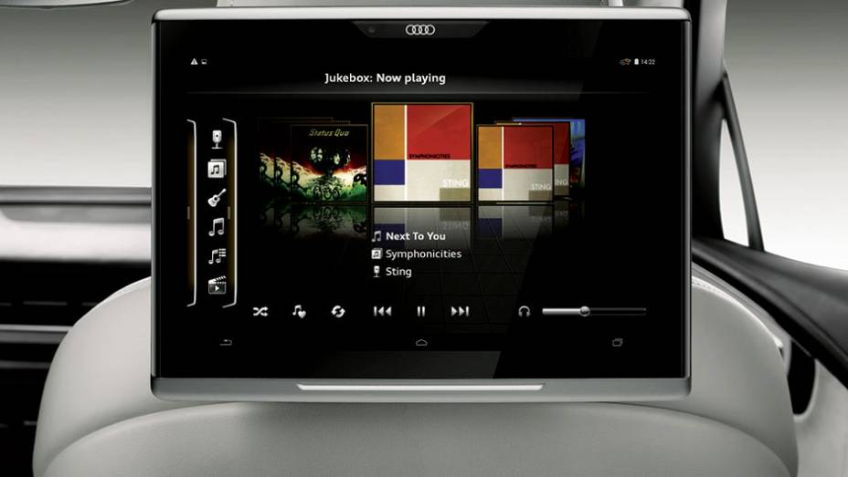 Atr&aacute;s do banco, um tablet opcional de 32 GB, que pode ser retirado do carro | <a href="https://preprod.quatrorodas.abril.com.br//carros/impressoes/audi-q7-866880.shtml" target="_blank" rel="migration">Leia mais</a>