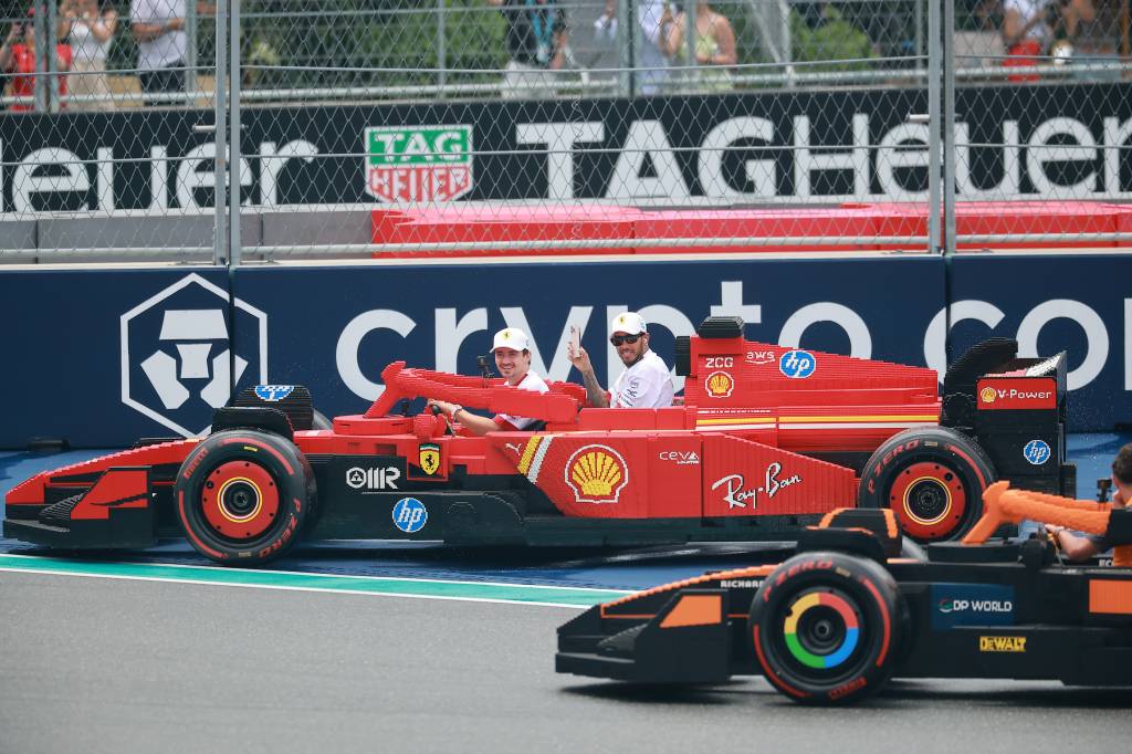 LEGO Group at F1 Grand Prix of Miami MIAMI, FLORIDA - MAY 04: Charles Leclerc of Monaco and Scuderia Ferrari and Lewis Hamilton of Great Britain and Scuderia Ferrari drive a LEGO car on the drivers parade during the F1 Grand Prix of Miami at Miami International Autodrome on May 04, 2025 in Miami, Florida. (Photo by Hector Vivas/Getty Images for LEGO Group)