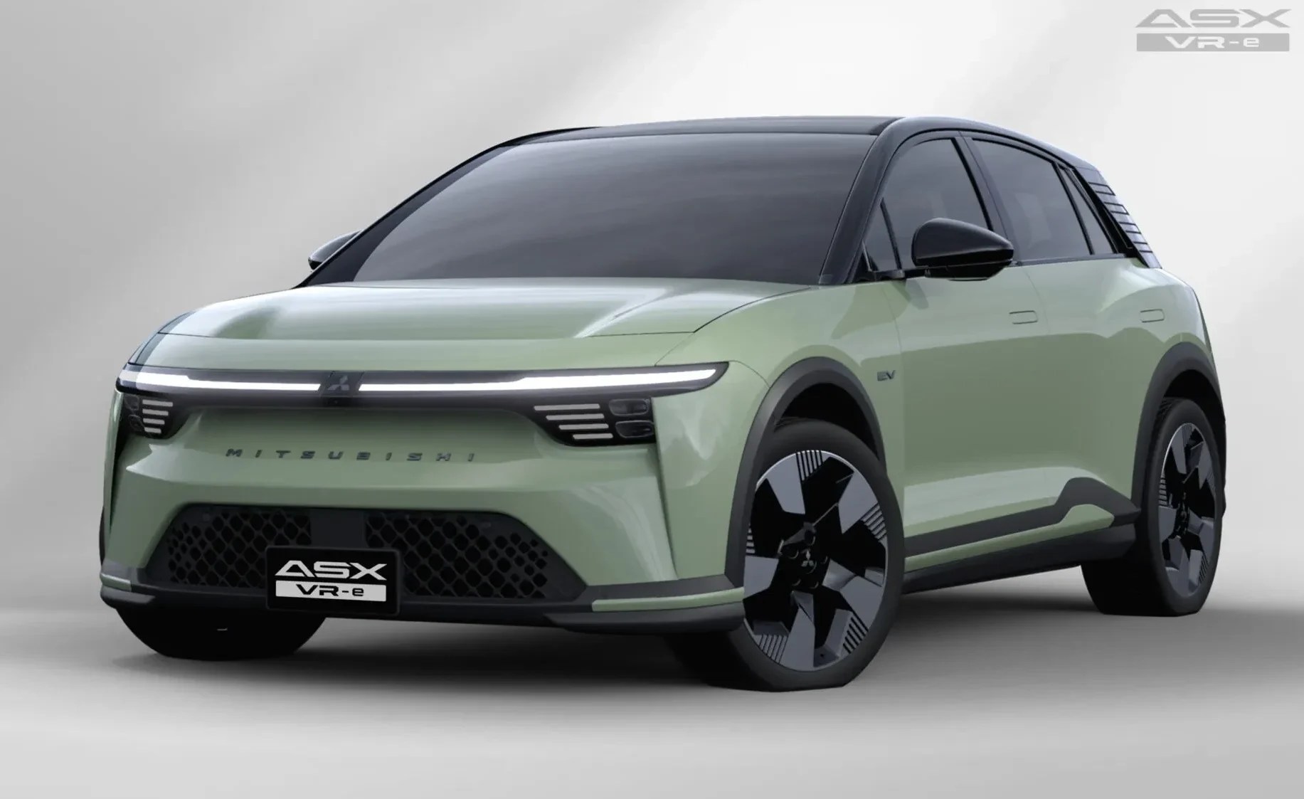 SUV Mitsubishi ASX VR-e verde-claro com teto preto, faróis em LED horizontais e verticais acesos, e rodas pretas com detalhes geométricos brancos, em fundo cinza-claro
